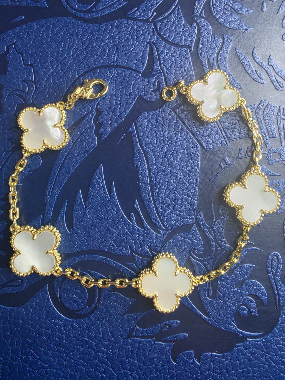 Van Cleef & Arpels Gold Bracelet with White Mother-of-Pearl Clover Motifs